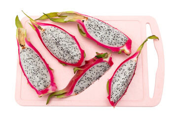 Dragon fruit on pink board isolated white background