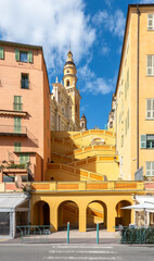 Ancient colorful staircase and the Basilica of Saint-Michel Archangel in Menton, France, Provence