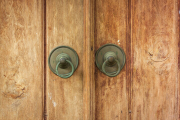 Old Wooden Door Detail With old ring Doorknobs