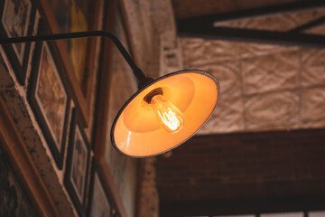 Modern lamp sticky on the wall as decoration at the cafe