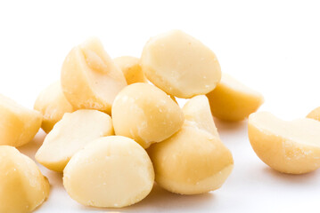 Fototapeta na wymiar Close-up macadamias on a white background