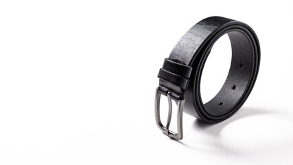 Twisted black leather belt with matted metal buckle isolated on white background. Fastened...