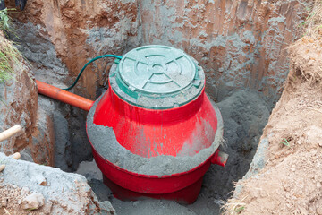 Installation of underground tank for sewage system - 782880948