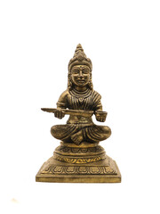 hindu goddess of food and nourishment, annapurna devi antique sitting handcrafted brass statue isolated in a white background