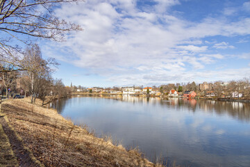 Walking along Nidelven (River) in a Spring mood in Trondheim city - 782889301