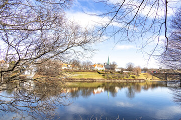 Walking along Nidelven (River) in a Spring mood in Trondheim city - 782889314