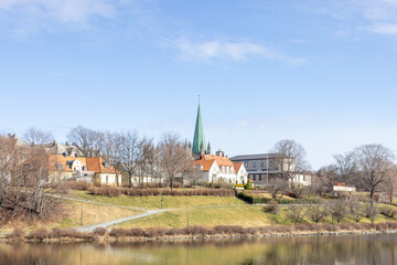 Walking along Nidelven (River) in a Spring mood in Trondheim city - 782889319