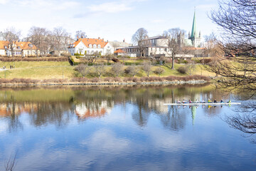Walking along Nidelven (River) in a Spring mood in Trondheim city - 782889337