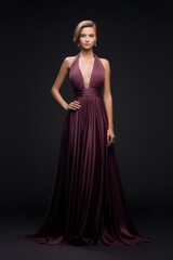 Fototapeta premium young Russian woman wearing gown for shoot and modeling on a dark background. Fictional Character Created by Generative AI.