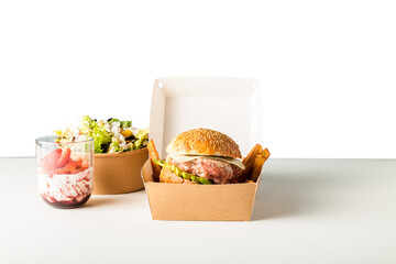 Burger in EcoFriendly Box: Sustainable Delivery Meal on White or Transparent Background - Ready to Eat Takeaway Food Packaging