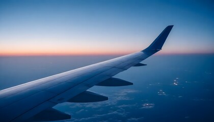 Airplane wing in dim light at blue hour, airplane travel concept, no borders
