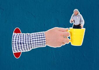 Inner Storm in a Teacup. Composite Collage. A man’s hand is holding a yellow ceramic mug. There is an angry man standing in the mug, aggressively clenching his fist