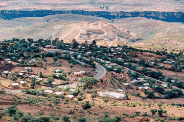 Beautiful mountain landscape with traditional Ethiopian village with houses Southern Nations...