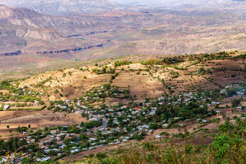 Beautiful mountain landscape with traditional ethiopian village with houses Southern Nations region, Ethiopia, Africa.