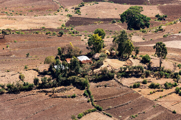 Beautiful mountain landscape with traditional Ethiopian village with houses. Oromia Region, Ethiopia, Africa.