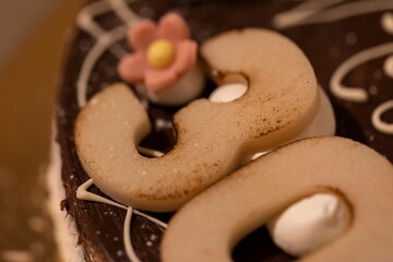 Closeup of a cake for the 30th birthday with a blurry background