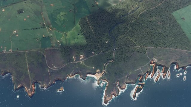 Top aerial view of the coast of Loch Ard Gorge at Port Campbell in Victoria. Australia