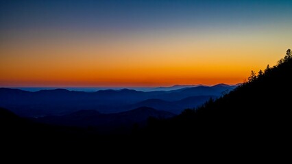 Beautiful dusk view over mountain silhouettes, can be used for wallpaper