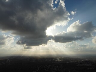 Beautiful view of white clouds over the village during sunrise