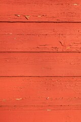Closeup of red wood wall texture use for background.