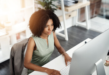 African business woman, smile and computer in office for career, online digital report and web...