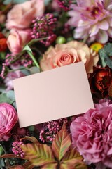 Close up of flowers with a blank card, perfect for various occasions