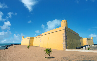 Beach in Ana Chaves Bay in São Tomé, with the XVI century historical São Sebastião fort, São Tomé and Principe (STP), Central Africa