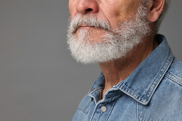 Man with mustache on grey background, closeup. Space for text