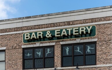 Bar and eatery sign on the building