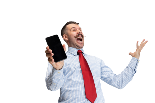 Surprised, embarrassed. Overjoyed young man in office clothes, manager with smartphone against transparent background. Concept of business, human emotions, facial expression, sales, ad