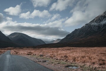 Beautiful view of the Buachaille Etive Mor with clouds in Glencoe