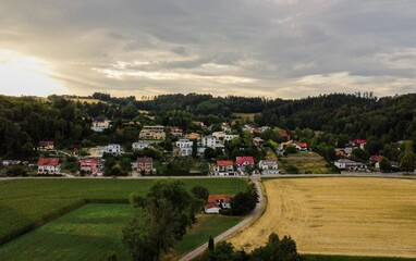 Aerial view to village and farm lands