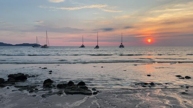 Sunset in Farang beach Trang Thailand long take.