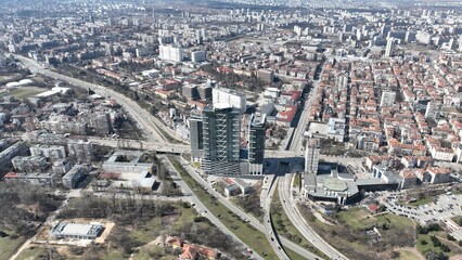 Obraz premium Aerial view of a modern building that stands out from the city of Sofia and the overall picture