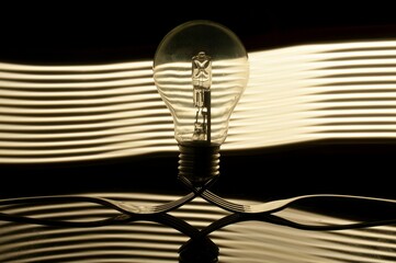 Closeup of a light bulb with led lights on the black background