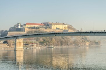 Historic castle building and the Varadin Bridge over the River Danube in Novi Sad, Serbia - obrazy, fototapety, plakaty