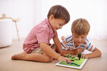 Boys, children and tablet with 3d games, virtual experience and bonding together in home or house. Brothers, family or happy kids with touchscreen for streaming online, building or gaming technology