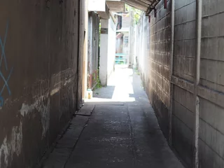 Zelfklevend Fotobehang narrow street in the town © nimit