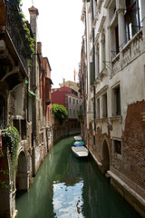 Picturesque view of a canal with ancient architecture on the San Polo river, Venice, Italy