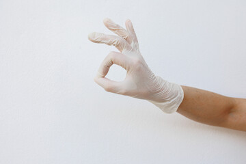 Female hands wearing disposable gloves