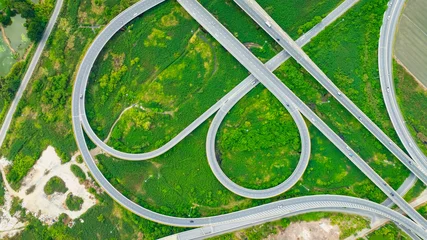 Fotobehang Aerial view of  expressway in the urban traffic way. with green background © SASITHORN