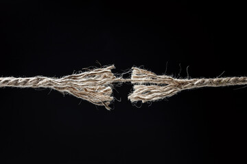 Frayed rope about to break background - 782969386