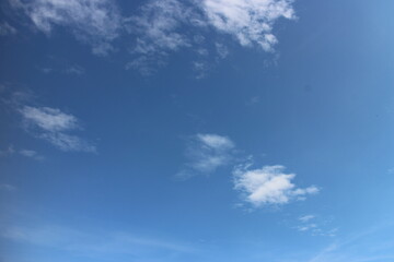 Fototapeta premium blue sky with white, soft clouds