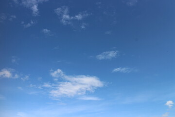 blue sky with white, soft clouds