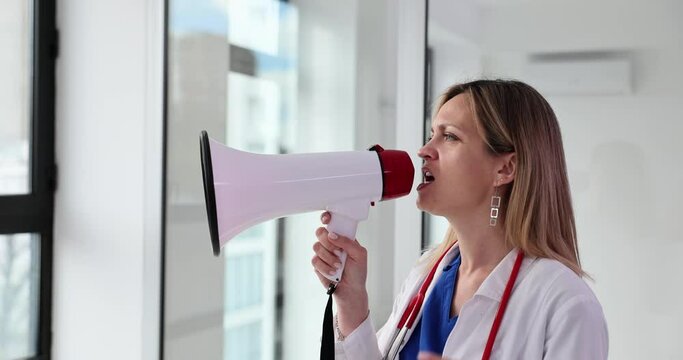 Doctor shouts into a megaphone about medical information