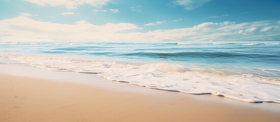Fototapeta na wymiar Daytime beach scene with crashing waves