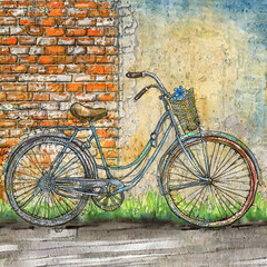 An antique bicycle by the side of the road with an old brick wall backdrop