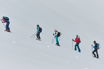 Fototapeta na wymiar Pushing Limits on High: A Team of Experts Conquers the Backcountry