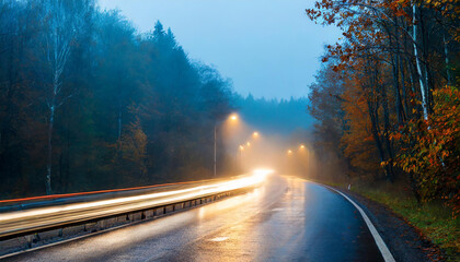 dangerous autumn road in fog and rain, slippery asphalt twilight on the highway car concept background - obrazy, fototapety, plakaty