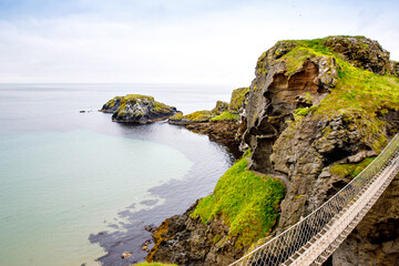 View from Carrick-a-Rede Rope Bridge, famous rope bridge near Ballintoy in County Antrim, Northern...
